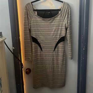 Bebe dress, mid calf length. Form fitted but stretchy material. Never worn